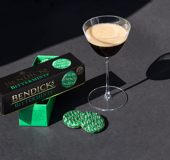 Bendicks Bittermints with a drink in a cocktail glass